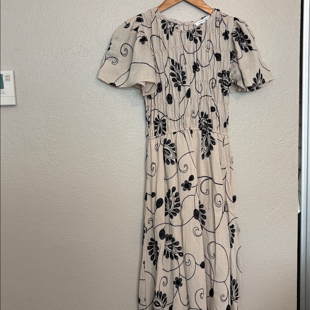 Elegant Beige and Black Floral Dress